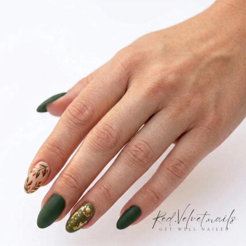 Matte olive green almond nails with a hand-painted leaf accent and gold foil